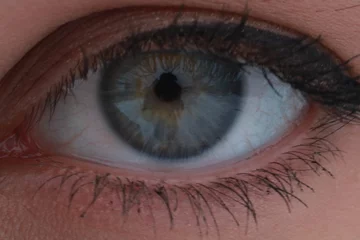 Möbelaufkleber close up of a female eye © Zoltn