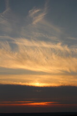 A sunset with clouds