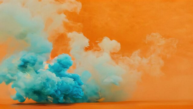 Explosion of turquoise smoke on an orange background.
