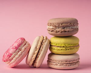 Image of Stacked macarons in pastel colors on a pink backdrop printed on Printed Glass Splashbacks