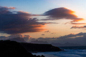 sunset on the shore at Fuerteventura with beautiful clouds