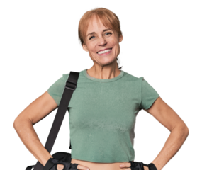 Mid-aged Caucasian athlete with gym bag confident keeping hands on hips.