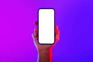 Cropped shot of guy's hand holding smartphone with blank screen