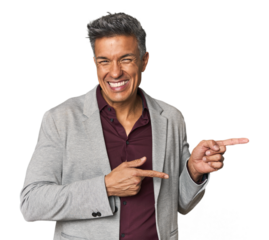 Middle-aged Latino man pointing with forefingers to a copy space, expressing excitement and desire.