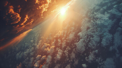An aerial view of the morning sun rising over beautiful clouds, suitable for nature and travel...