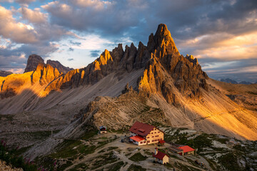 Rifugio di Lavaredo in Italian Dolomites at late summer evening with peaks warm light peaks in...