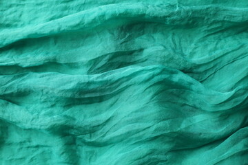 crumpled piece of green fabric.
