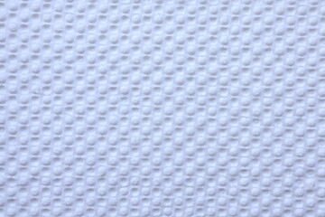 White  texture consists of small, evenly spaced bumps. white material 