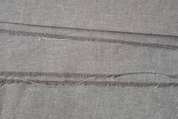 Natural linen fabric with a raw edges