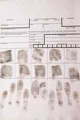 Close-up fingerprint card with fingerprints, forensic examination