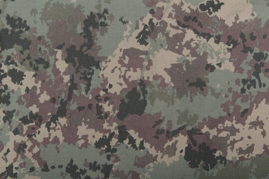 Textile camouflage. Abstract background and texture.