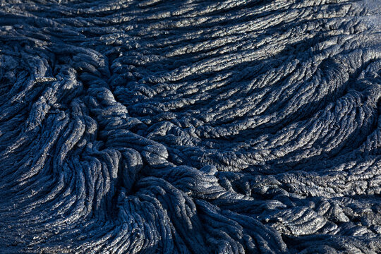 Detail of solidified Pahoehoe or rope lava in Hawaii Volcanoes National Park in USA 
