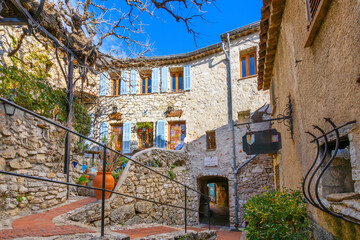 The narrow hillside alleys and streets of shops and cafes inside the medieval hilltop village of Eze, France, along the Cote d'Azur French Riviera.	