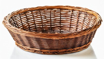 oval brown wicker basket made of natural vine isolated