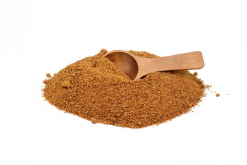 Coconut palm sugar with wooden spoon isolated on white. brown coconut palm sugar. 