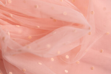 Tulle fabric texture background, textile pattern, pink polka dot on tulle, copy space