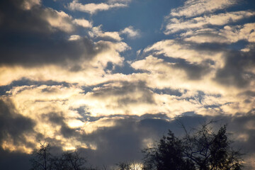 Fototapeta na wymiar Beautiful with blue sky rays on dark background. Colorful sunrise
