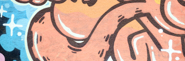 Colorful background of graffiti painting artwork with bright aerosol outlines on wall. Old school...