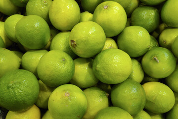 Stack of Limes on a market stall