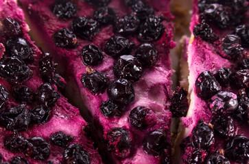 Cheesecake with black currants, background, close-up