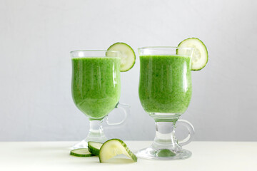 Green vegetable smoothie with fresh vegetables