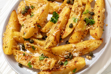 greek lemon potatoes with garlic, cheese, capers