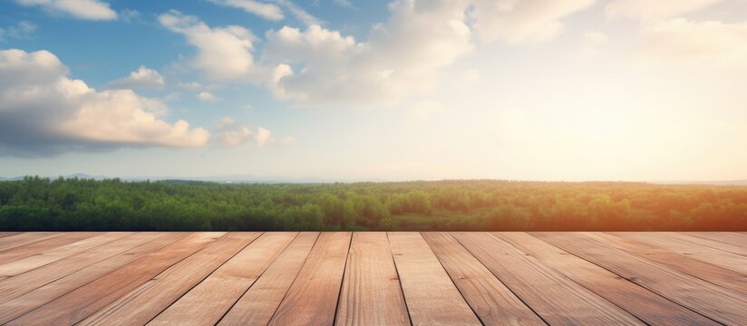 The image shows a wooden floor with a soft focus background of the clear blue sky and fluffy white clouds. The wooden floor is well-maintained and provides a stark contrast to the vastness of the sky.