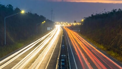 Generated image of A highway scene at night, with the glow of tail lights stretching into the distance