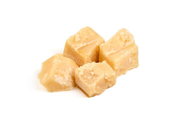 Parmesan cheese pieces, hard cheese, isolated on white background.