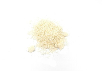 Pile of grated parmesan cheese isolated on white