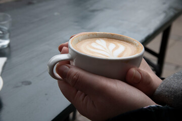 cup of coffee in hand