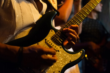 Guitarist performing solo in a musical performance in Santo Antonio, a neighborhood in the city of...