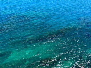 Shiny sea blue turquoise water surface, aerial view.