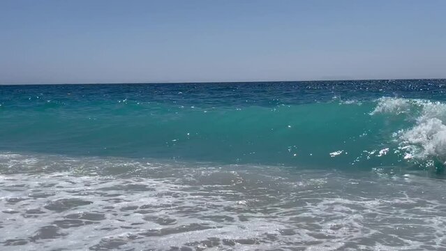 Rocky beach and crystal turquoise water of Ionian Sea in Albania.