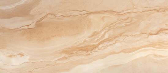 This close-up view showcases the intricate details and smooth texture of a beige marble surface....