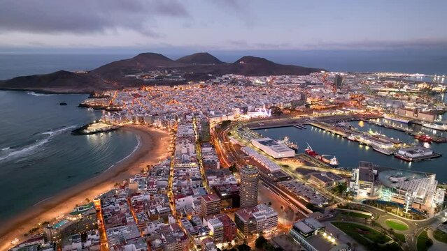 4k Aerial view of Las Palmas de Gran Canaria, the capital city of the Canary Islands. Spain. Playa de Las Canteras beach
