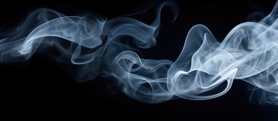 Fototapeta premium A dense white cloud of smoke or steam contrasts boldly against a stark black background. The smoke appears to be billowing and dispersing in various directions, creating a captivating visual effect.