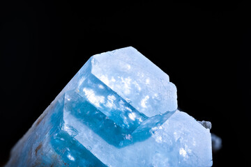 Aquamarine crystal from Namibia. macro photography detail texture background. close-up raw rough unpolished semi-precious gemstone
