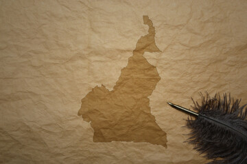 map of cameroon on a old paper background with old pen