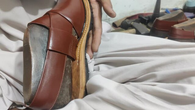 Craftsman at Work: Cobbler Designing Handmade Shoes