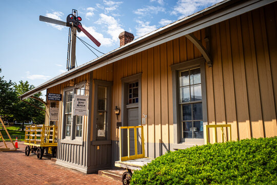 The old train station in Herndon, Virginia, with a semaphore behind.