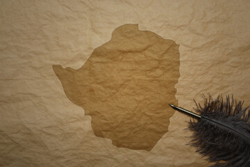 map of zimbabwe on a old paper background with old pen