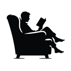 Silhouette of a Person Reading in a Cozy Armchair