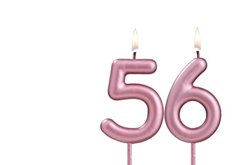 Candle number 56 - Lit birthday candle on white background