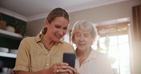 Cellphone, conversation and woman with senior mom helping on social media, app or internet. Discussion, technology and female person talking, bonding and explaining phone to elderly mother at home. - Powered by Adobe