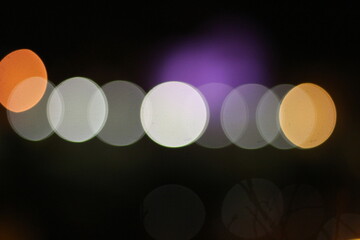 Nocturnal Euphoria: Abstract Bokeh Lights Dance in the Night