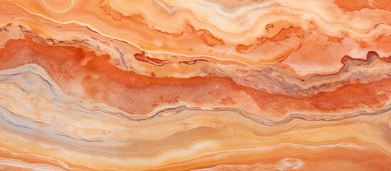 Obraz premium This close-up view showcases the intricate patterns of an orange and white marble surface. The vibrant colors and smooth texture are visible, highlighting the natural beauty of the material.