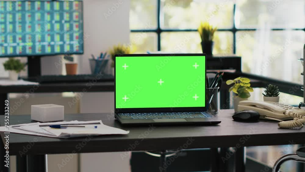 Poster focus on isolated screen laptop on company desk with computer desktop in blurry background showing s