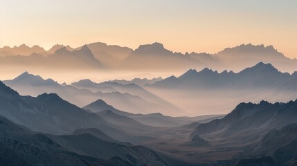 A majestic landscape of a mountain range at dawn, with the first light casting golden hues over the peaks. The Sony A7R IV's 61-megapixel sensor should capture the intricate details of the rugged 