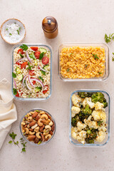 Healthy vegan meal prep with roasted vegetables, cooked lentils, couscous salad and nuts - 755238663